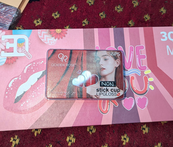 Qoiden Rose lipgloss